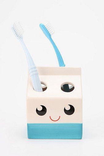 Bote de leche para guardar cepillos dentales